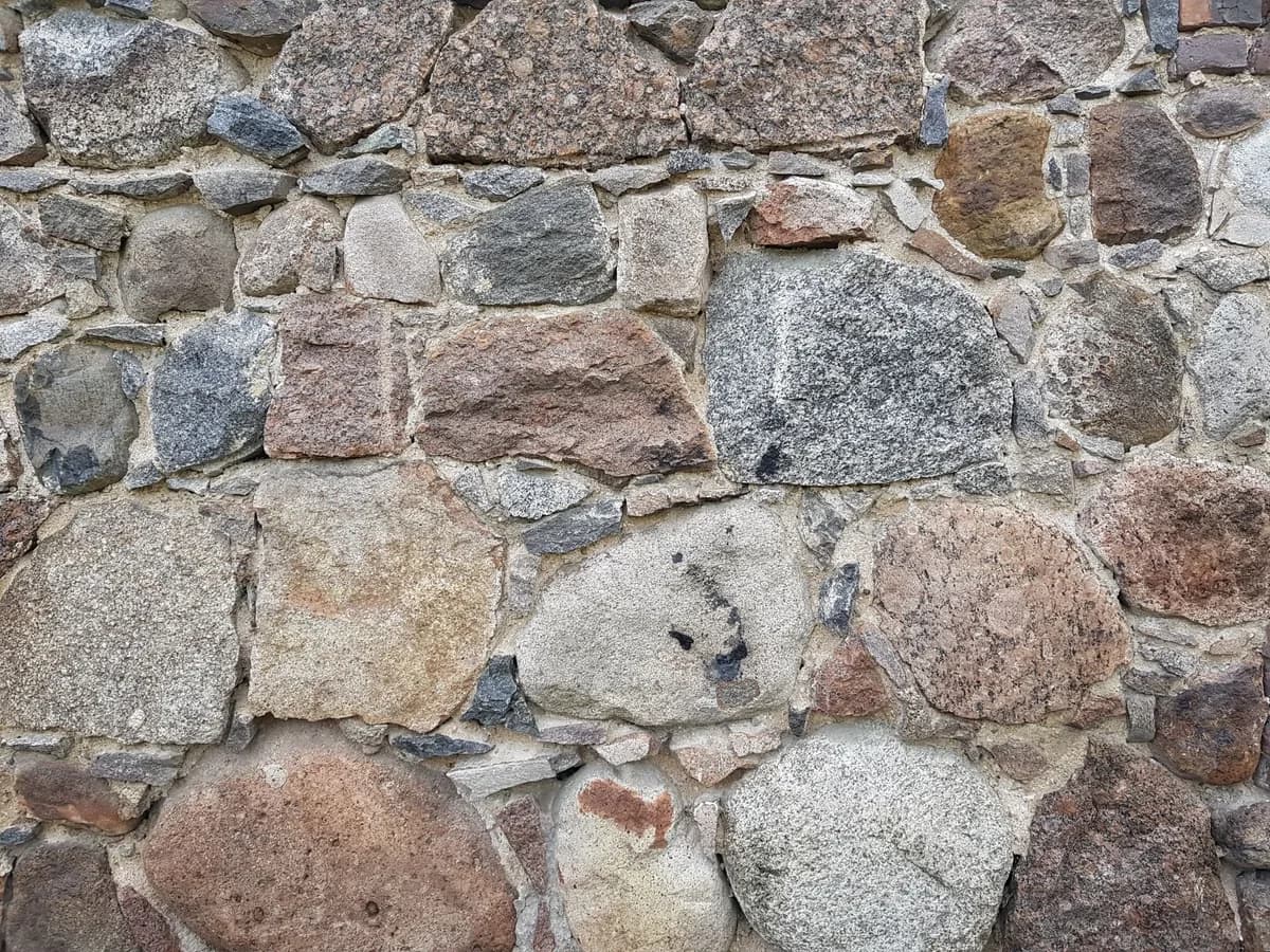 Stonework & Masonry — Natural stone, veneer, and masonry craftsmanship for lasting curb appeal.